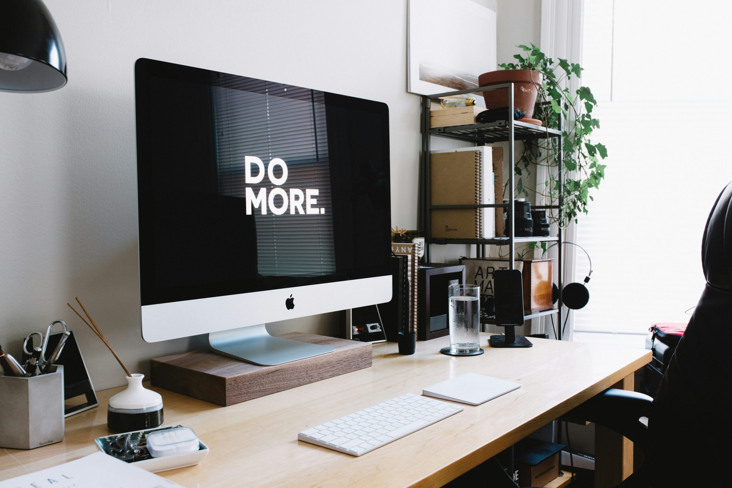 photo of computer monitor with the words "do more"