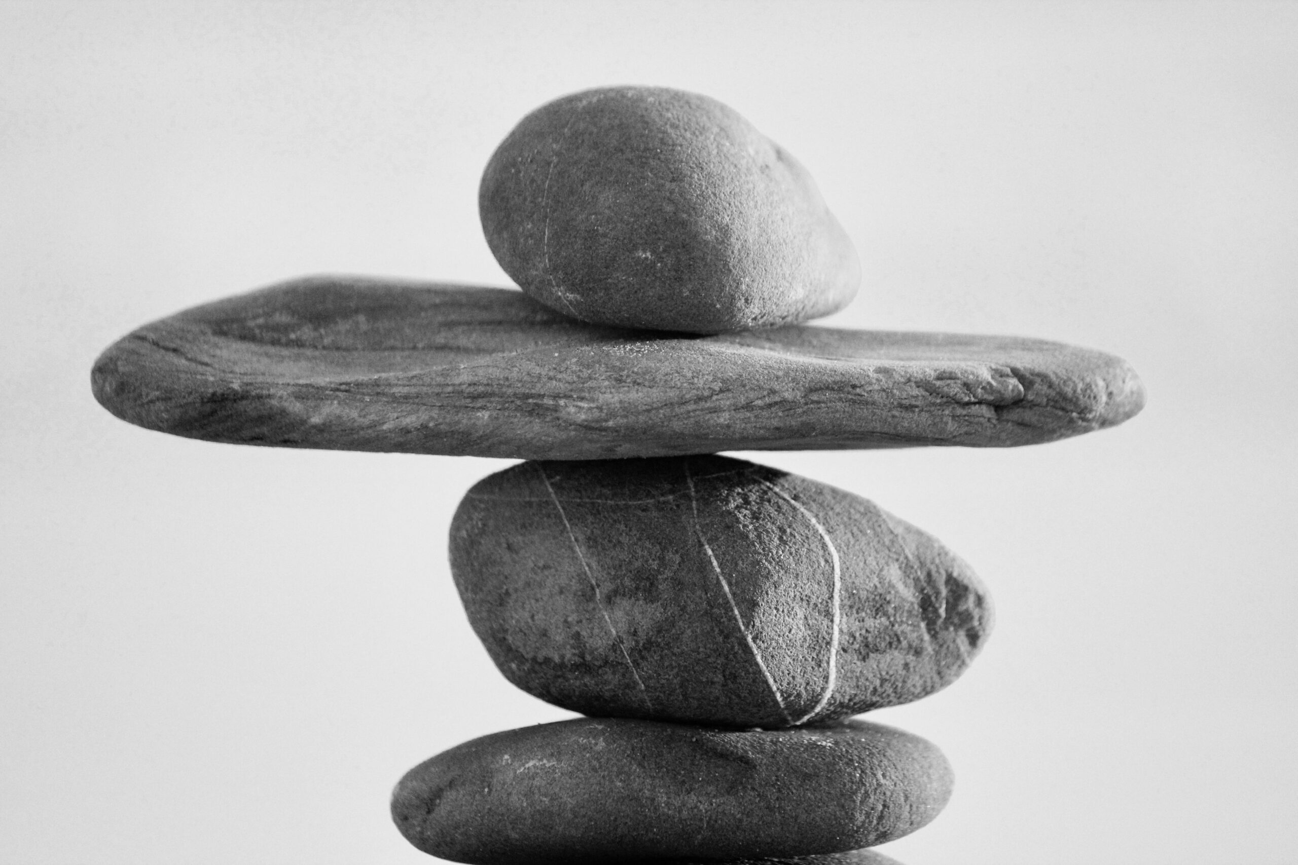photo of rocks balancing on top of each other